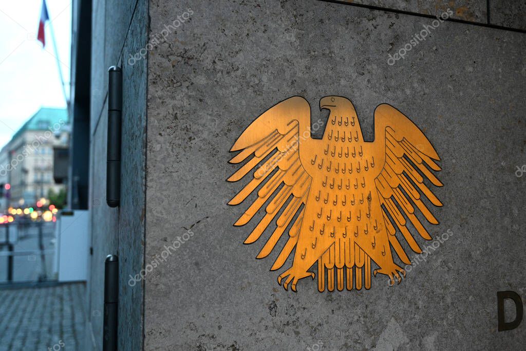 Berlin, Germany - August 2, 2024: The German Bundestag (Deutscher Bundestag) logo on German Bundestag building