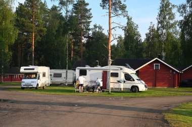 Pyhajarvi, Finland - July 25, 2024: Camping on Lake Pyhajarvi in the south of Northern Ostrobothnia region, Finland. clipart