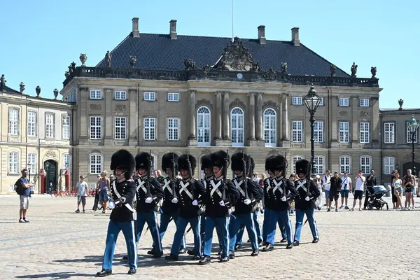 stock image Copenhagen, Denmark - August 1, 2024: Changing of the guard in Amalienborg Palace in Copenhagen.