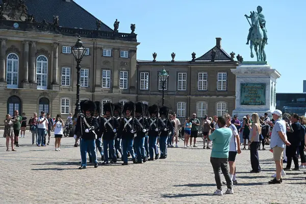 stock image Copenhagen, Denmark - August 1, 2024: Changing of the guard in Amalienborg Palace in Copenhagen.