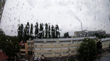 Power Plant Chimney On A Rainy Day View From Window