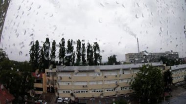 Power Plant Chimney On A Rainy Day View From Window