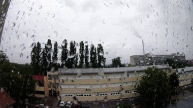 Power Plant Chimney On A Rainy Day View From Window