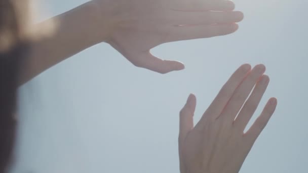 Female Hands Background Sky Sun Rays Illuminate Hands Girl Makes — Stock Video