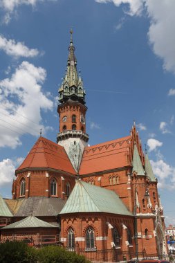 St. Joseph's Church built from red brick. Gothic architecture in Krakow, Poland. clipart