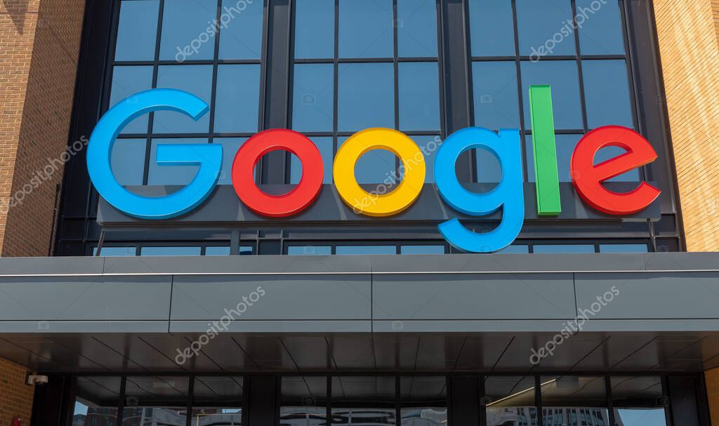 Detroit, Michigan, USA - May 30, 2022: Google sign at the entrance of office building in Detroit, Michigan. Google LLC is world famous Information technology, e-commerce and advertising company.