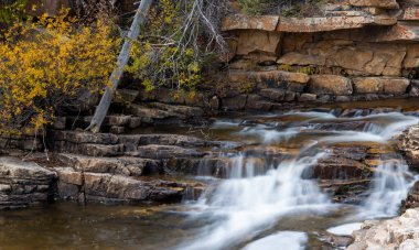 Running water and cascades of Provo river in Uinta Wasatch Cache national forest in Utah