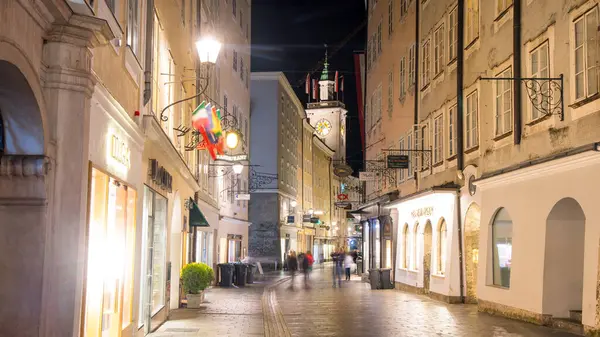 stock image Salzburg, Austria - October 16, 2023 : Smoke lamps and wrought iron signs at Grain Lane street the famous shopping street in Salzburg, Austria