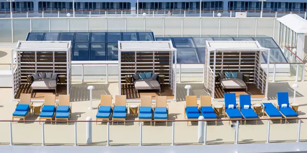 stock image Aerial panoramic view of Cabanas and beach chairs on a cruise liner deck.