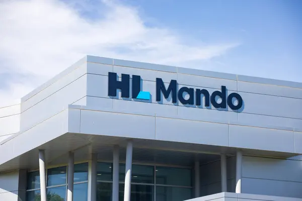 stock image Novi, MI, USA - June 16, 2024:Signage of HL Mando Corporation is the largest global Tier 1 Korean Original Equipment Manufacturer and supplier to GM, Ford, Chrysler, Nissan, Kia located in Novi, MI.