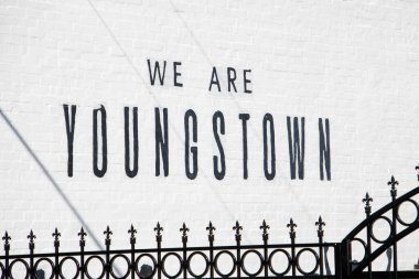 YOUNGSTOWN, OHIO - AUGUST 14, 2024: Signage of We are Youngstown on white wall in Youngstown downtown, Ohio. clipart