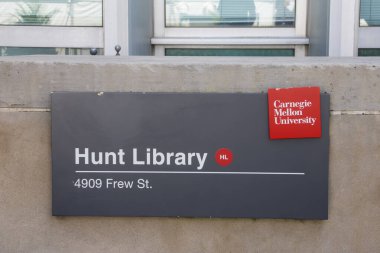 Pittsburgh, Pennsylvania, USA - August 12, 2024: Hunt Library sign on Carnegie Mellon's university Pittsburgh campus. clipart