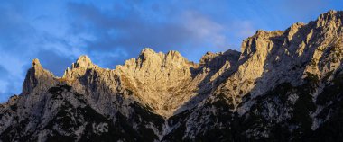 Panoramic view of the Karwendel is the largest mountain range of the Northern Limestone Alps at Austria and Germany border. clipart