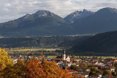 Church of the Holy Cross in Zirl town in Austria in autumn time.