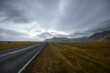 Scenic famous ring road high way in Iceland on a cloudy day clipart