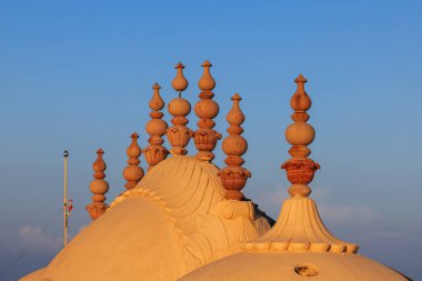 Decorative ornaments on top of Chhatri or umbrella at roof top of historic Nahargarh fort in Jaipur, India