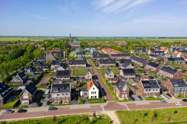 Luttelgeest, Hollanda - 13 Nisan 2024: Hollanda 'da 1950 yılında kurulan Luttelgeest köyünün manzaralı manzarası