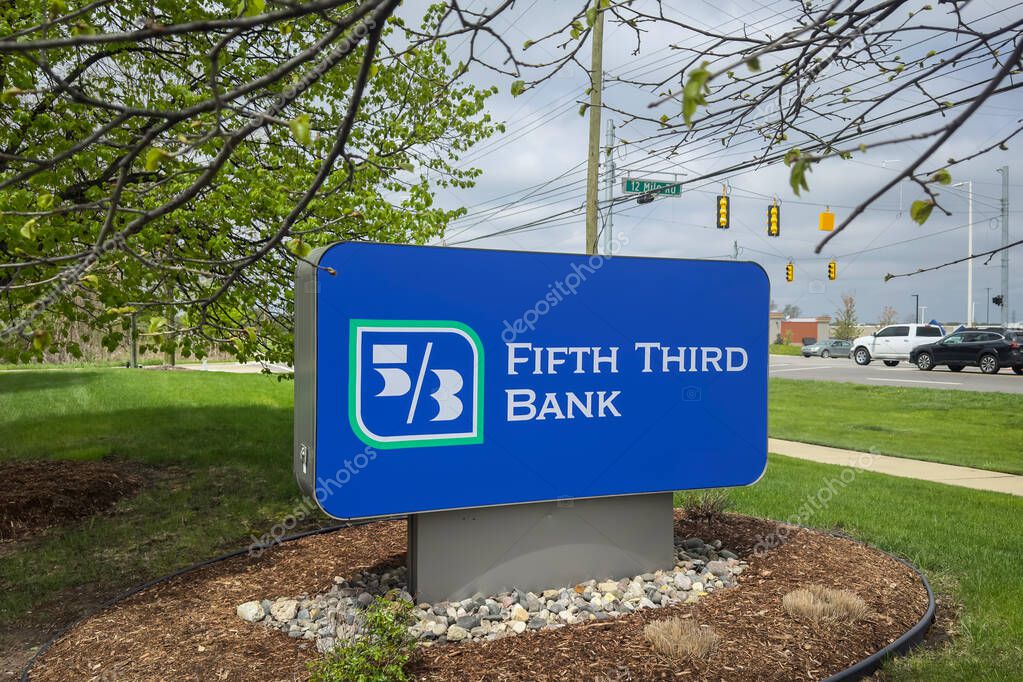 Novi, Michigan - May,5, 2025 : Fifth Third bank street sign in Novi, michigan , Fifth Third bank operates 1100 branches in 11 states.