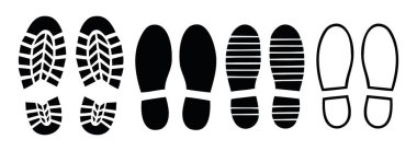 Beyaz arkaplanda vektör ayakkabı izleri kümesi.