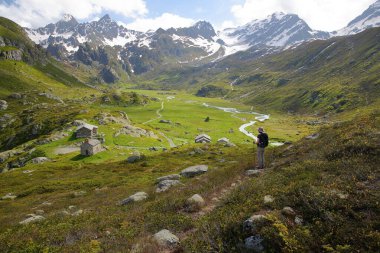 The valley of the petite Sassiere, Sainte Foy Tarentaise, Northern French Alps, Savoie, France, with the mountain refuge of Ruitor, the hamlet Sassiere and mountain streams clipart