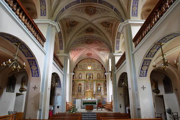 stock image ARECHES, BEAUFORT, NORTHERN ALPS, FRANCE - JUNE 30, 2024: The interior of the church Saint Jean Baptiste of Areches, Beaufortain, Savoie