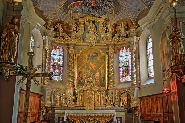 stock image HAUTELUCE, NORTHERN ALPS, FRANCE - JULY 2, 2024: The magnificent baroque altarpiece inside Saint Jacques d'Assyrie church, Beaufortain, Savoie, savoy