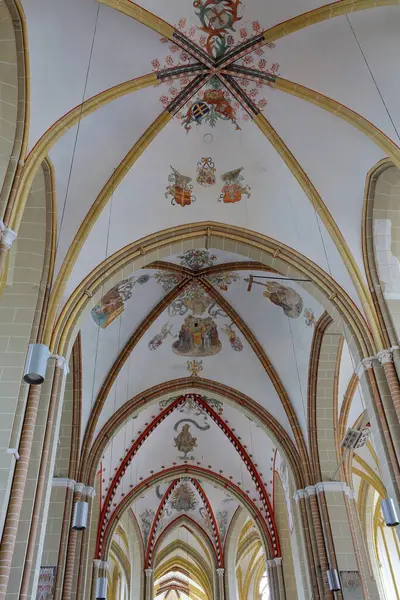 stock image ZUTPHEN, GELDERLAND, NETHERLANDS - AUGUST 18, 2024: The interior of Saint Walburgiskerk church with the ceiling and vaults decorated with frescoes