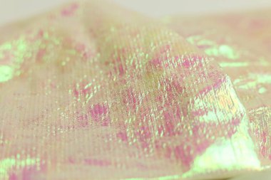 Yumuşak odaklı, kumaş desenli soyut pembe arkaplan