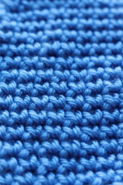 Tığ işi kumaş dokusu arkaplanının yakın plan detayları. Mavi renk