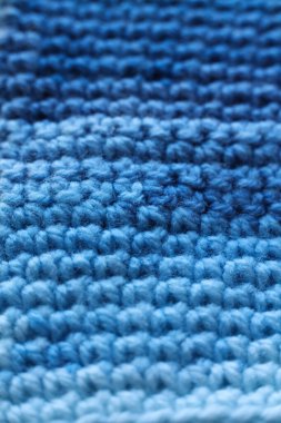 Tığ işi kumaş dokusu arkaplanının yakın plan detayları. Mavi renk
