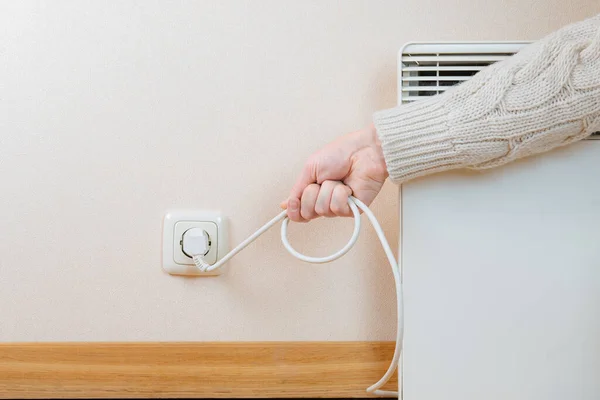 stock image Electrical heater is switched off due to the energy crisis in world, sanctions and expensive and high energy prices. Concept of saving energy, electricity and power frugality.