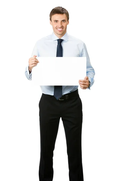 微笑的年轻商业男人显示空白招牌 孤立在白色背景的全身画像 — 图库照片