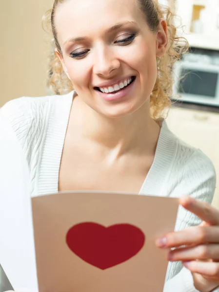 Cheerful Smiling Young Woman Reading Valentine Card — Stock Photo, Image