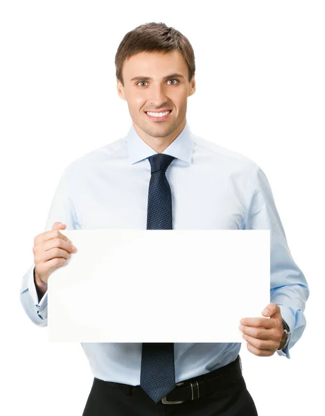 幸せな笑顔若いビジネス男白い背景で隔離された空白の看板を示す — ストック写真