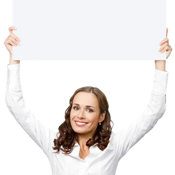 幸せな笑顔若いビジネス女白い背景で隔離された空白の看板を示す ストック画像