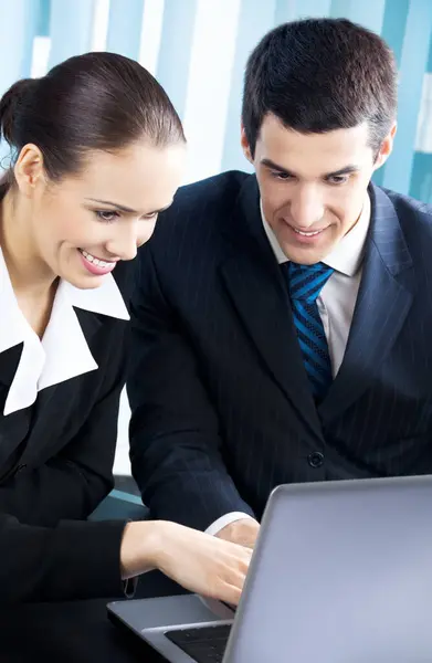 Two Smiling Young Businesspeople Working Laptop Office — Stock Photo, Image