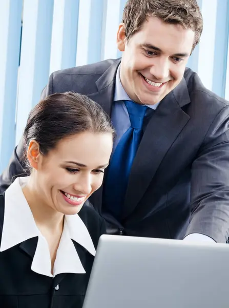 Two Happy Smiling Cheerful Young Businesspeople Working Laptop Office — Stock Photo, Image