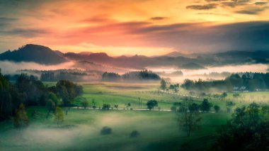 View of the landscape of Czech Switzerland with fog and hills