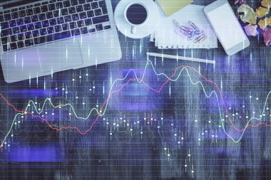 Finans piyasası grafiği ve masaüstü bilgisayarının üst görüntüsü. Çifte maruziyet. Yatırım kavramı.