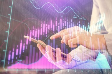 Bir adamın elini tutarken ve dijital bir cihaz ve ön grafik çizimi kullanırken çift pozlama. Finansal piyasa kavramı.