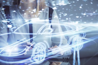 Bilgisayarda ve otomobil temalı çizimlerde kadın elinin çifte pozu. Yüksek Teknoloji kavramı.