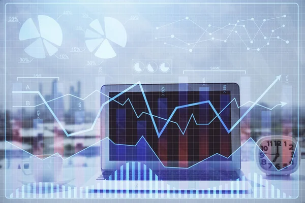 机やパソコンを背景にした株式市場グラフ 多重露光 金融分析の概念 — ストック写真