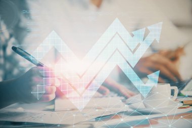 Double exposure of arrow drawing over people taking notes background. Concept of growth