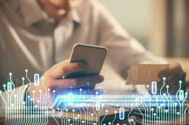 Dijital bir cihaz ve veri temalı çizim kullanan bir adamın el ele tutuşması. Yenilik kavramı.