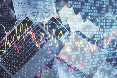 Finans piyasası grafiği ve masaüstü bilgisayarının üst görüntüsü. Çoklu maruz kalma. Yatırım kavramı.