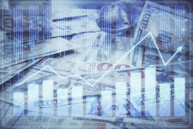 Forx grafiğinin çok sayıda görüntüsü bize dolar banknotları arka planında görünüyor. Finansal başarı piyasası kavramı.