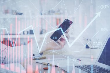 Bir adamın elini tutarken ve dijital bir cihaz ve ön grafik çizimi kullanırken çift pozlama. Finansal piyasa kavramı.
