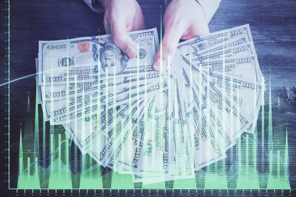 Mehrfachbelichtung Von Finanzgraphen Die Hologramme Und Dollarscheine Und Menschenhände Zeichnen — Stockfoto