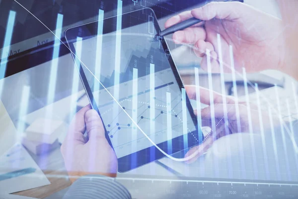 stock image Double exposure of man's hands holding and using a phone and financial chart drawing. Market analysis concept.