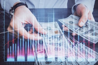 Finansal grafiğe çoklu pozlama hologram, Amerikan dolarları ve insan eli. Analiz kavramı.